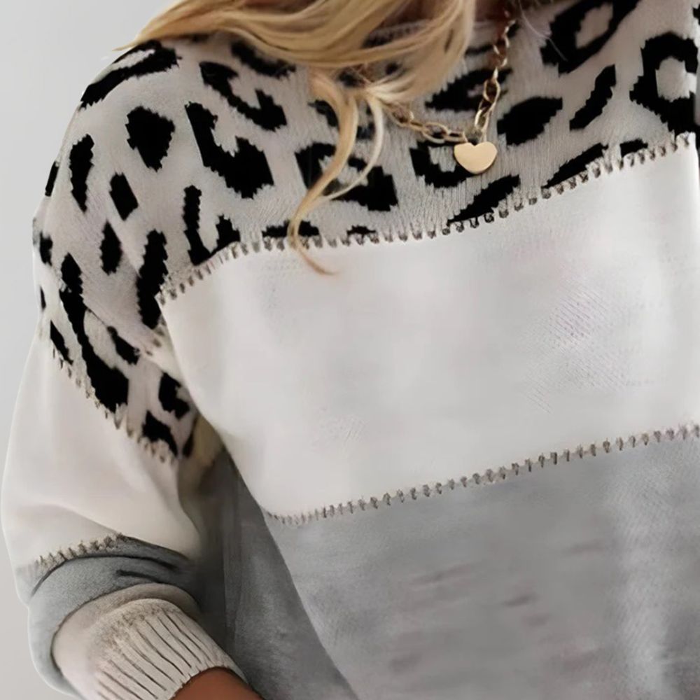 Elin trui detail leopardprint schoudergedeelte