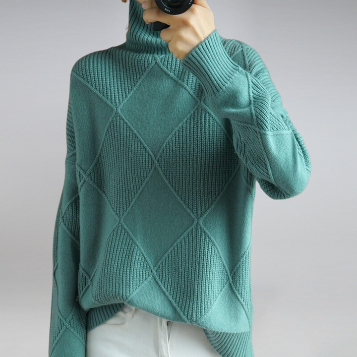 Elin turquoise coltrui, vooraanzicht met hand bij kraag