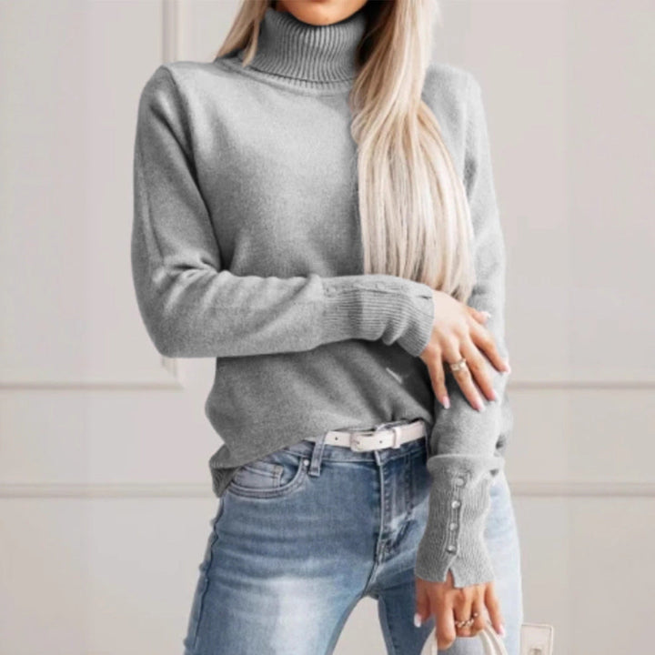 Fleur coltrui gedragen met jeans, vooraanzicht