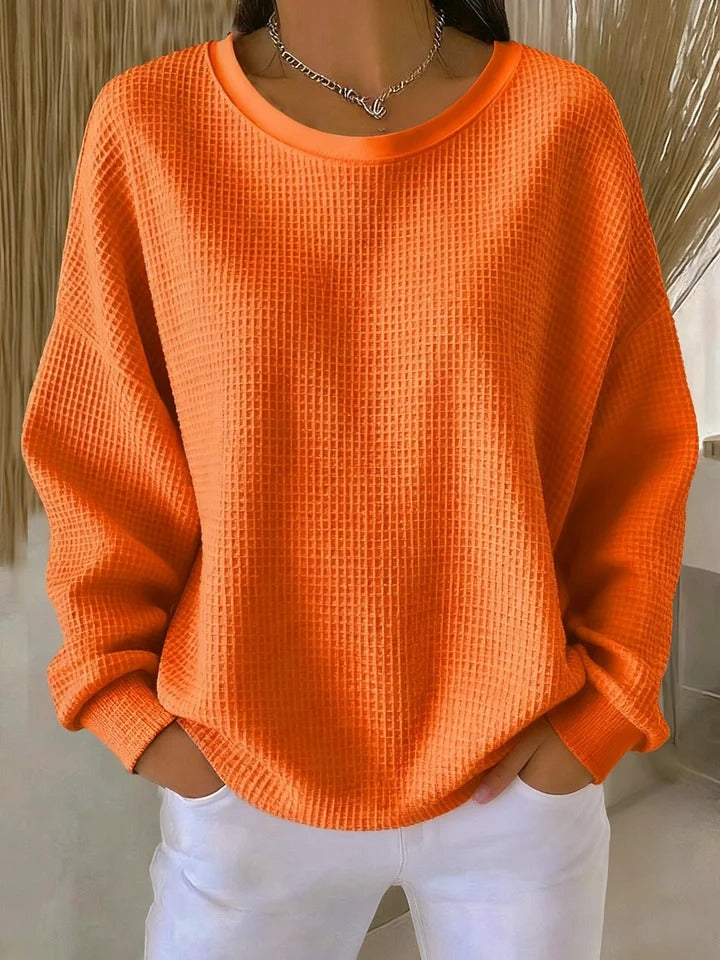 Ilse oversized waffeltrui met ronde hals in oranje, vooraanzicht