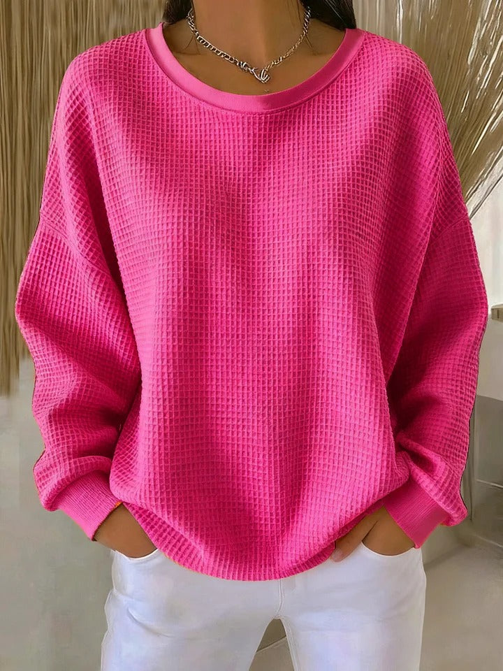 Ilse oversized waffeltrui met ronde hals in fuchsia, vooraanzicht