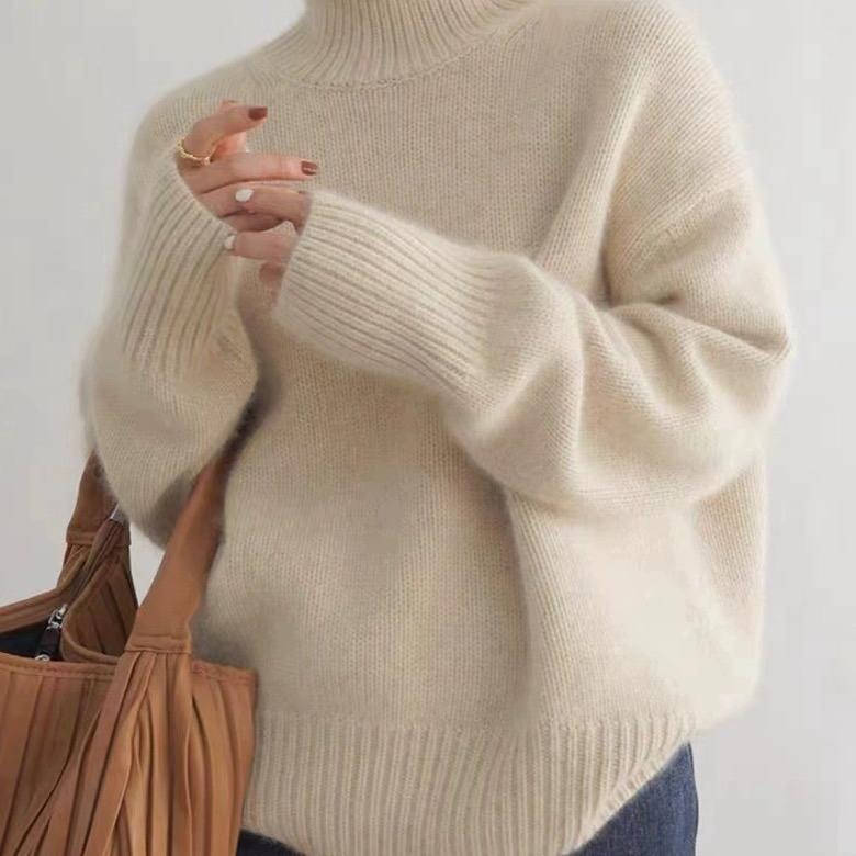 Marit oversized coltrui in gebroken wit, zijaanzicht