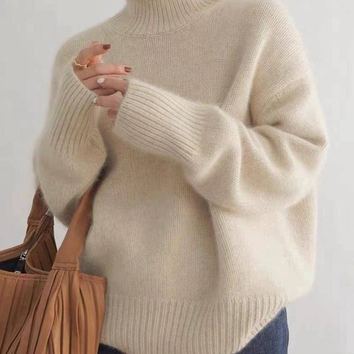 Marit oversized coltrui in gebroken wit, zijaanzicht