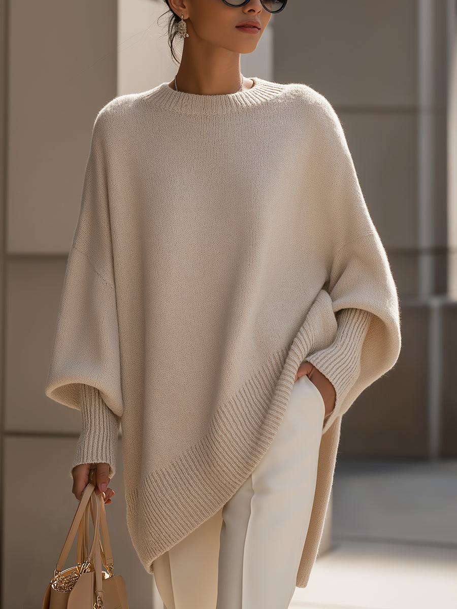 Marleen oversized asymmetrische poncho trui, vooraanzicht met tas