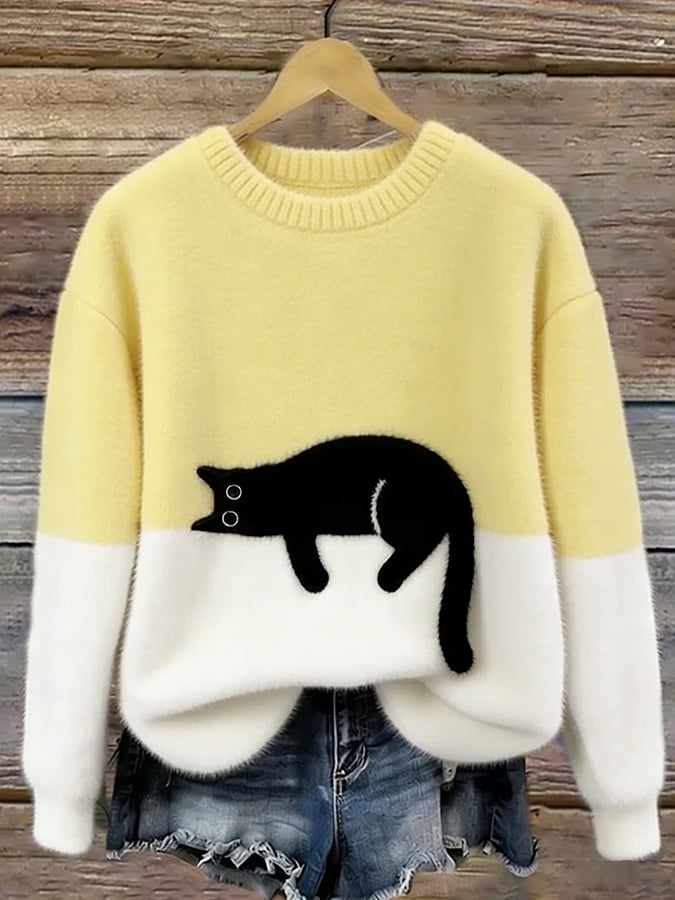 Merel colorblock trui met kattenprint in geel en wit, vooraanzicht