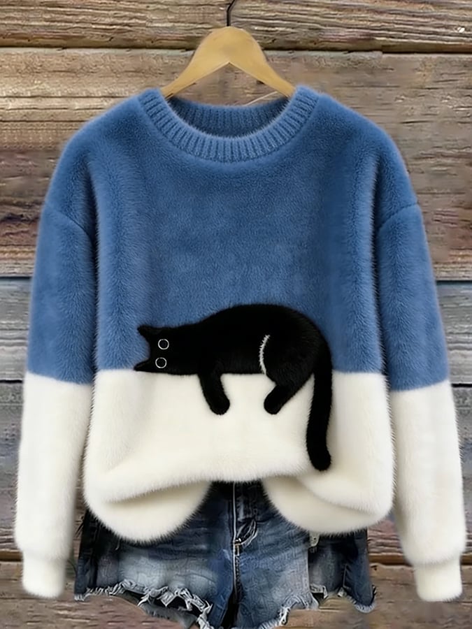 Merel colorblock trui met kattenprint in blauw en wit, vooraanzicht
