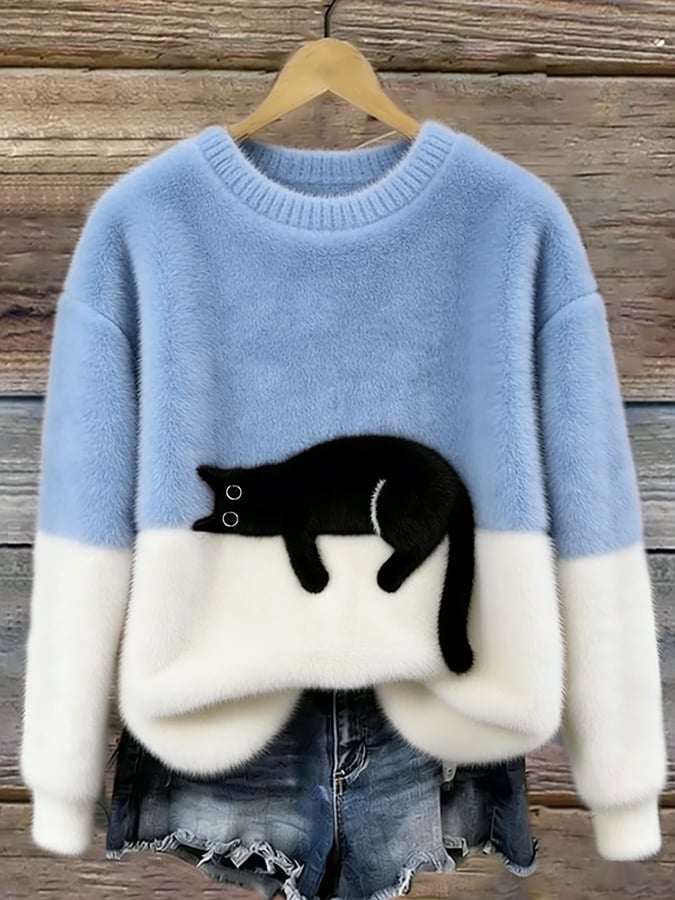 Merel colorblock trui met kattenprint in lichtblauw en wit, vooraanzicht