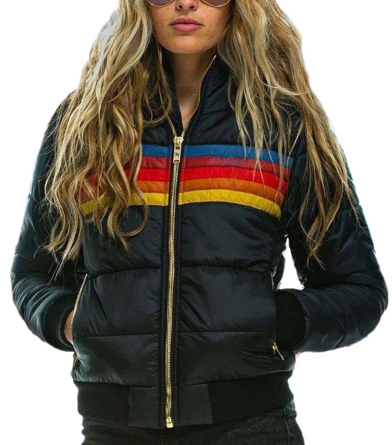 Noor puffer jas close-up met goudkleurige rits en regenboogstreep