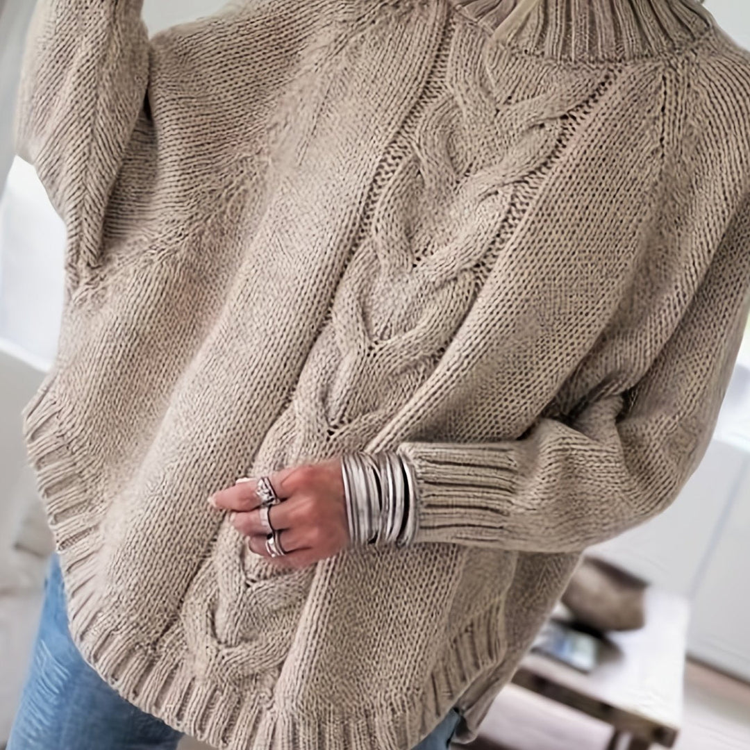 Noor beige trui, close-up kabelpatroon achterzijde