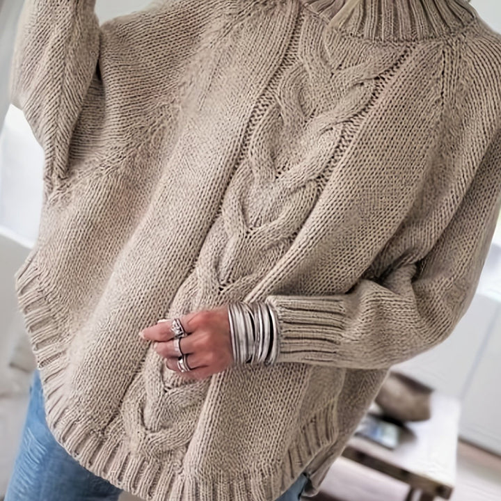 Noor beige trui, close-up kabelpatroon achterzijde