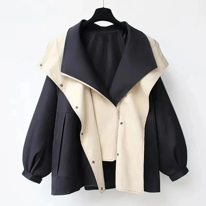 Rosalie oversized colourblock jas in zwart-beige kleurvariant