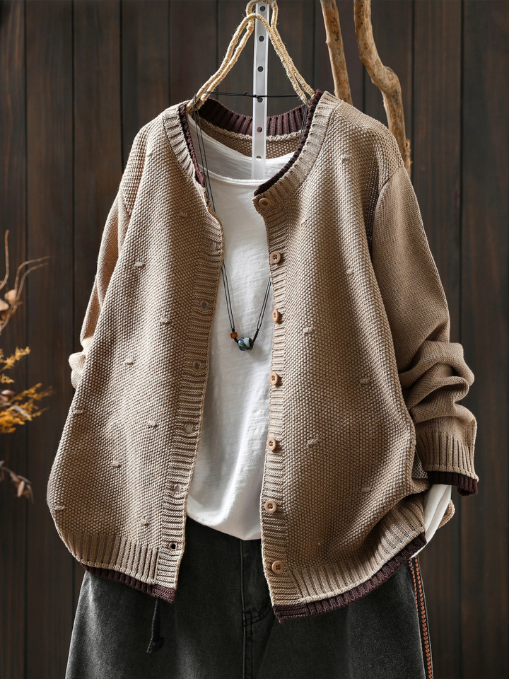 Wieke oversized gebreid vest in beige, vooraanzicht