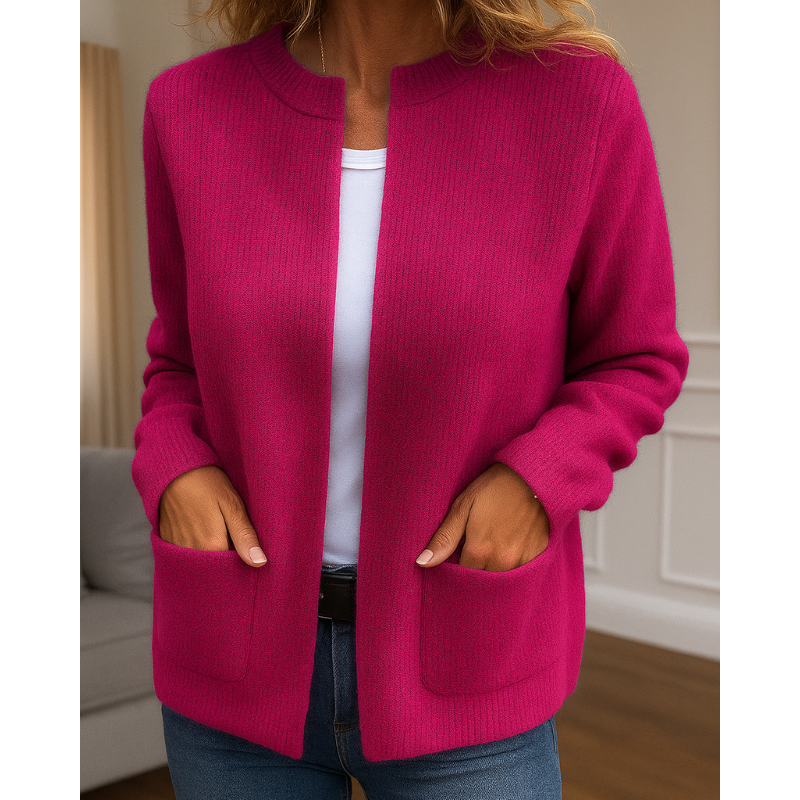 Detailfoto fuchsia roze gebreid vest met open rits