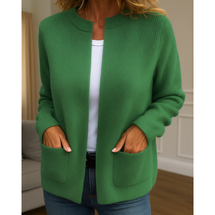 Detailfoto groen gebreid vest met open rits